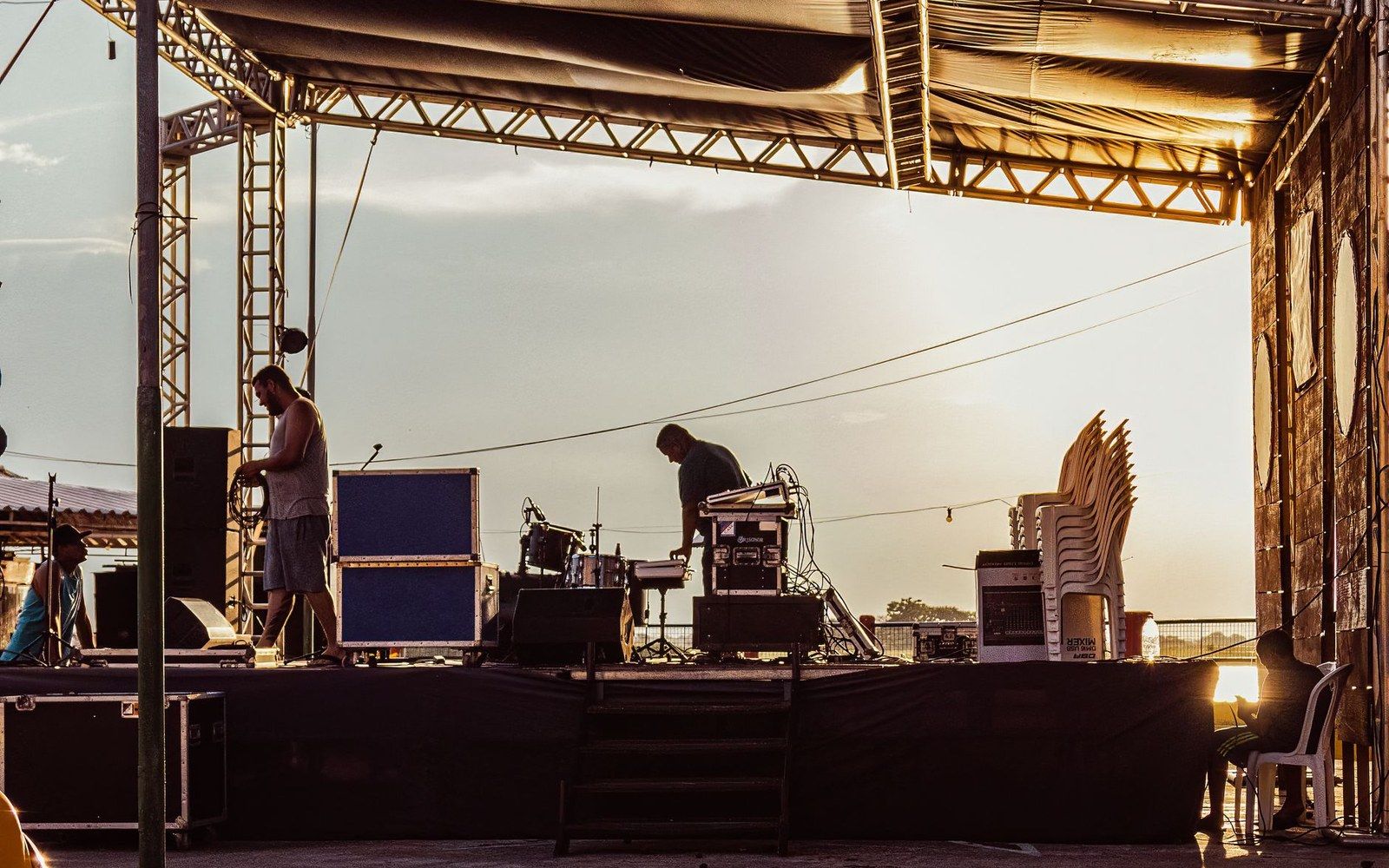 A crew flying a line array at a field site