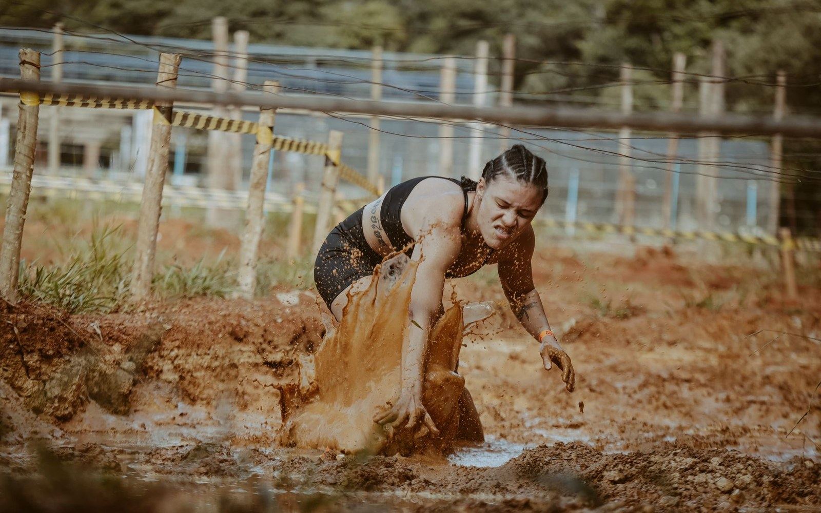 Mud churned by vehicle traffic on a festival field